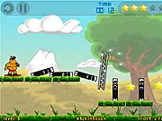 DomiHammi free online physics puzzle game featuring a hamster and dominoes