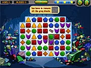 Shape Matcher 2 free online game screen showing a puzzle board full of colored gem stones and breakable gray blocks