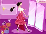 The Couple Dress Up game screen showing a styled couple in elegant evening wear, free online fashion game
