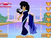 Screenshot of The Indian Fashion (Hindi) dress-up game showing a model wearing a vibrant, colorful sari and traditional Indian jewelry