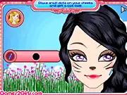 The free online makeover game Glam Cat Eyes showing a model with dramatic, winged black eyeliner, a painted nose, and glittery cat makeup