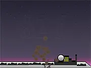 Comet City online game screenshot, showing a ball bouncing to destroy asteroids and protect the urban skyline