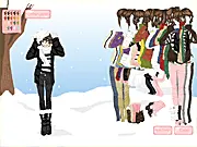 Last Snow Dressup free online game screenshot showing a cute girl in a stylish, layered outfit standing in a snowy winter landscape.