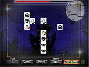 Halloween Link Adventure gameplay screenshot showing various Halloween icons like pumpkins and ghosts on a puzzle grid