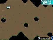 The Winged Bullet character flying rapidly through a narrow, dark cave passage, with small glowing bugs and colorful flowers visible as collectible items.