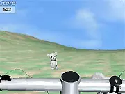 A character riding a bicycle at high speed down a steep, grassy hill, narrowly avoiding a large, misplaced teddy bear on the track.