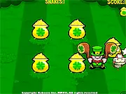 Wallop free online arcade game screenshot showing a hand ready to smack snakes near pots of gold, with a four-leaf clover visible