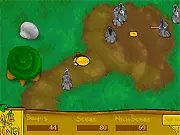 Screenshot of Save the Ring game, showing a character avoiding a sword-wielding enemy (Ringwraith) to collect a gold ring on a top-down level.