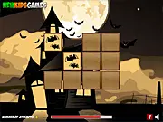 Play Scary Halloween Memory free online game. Image shows memory squares with scary Halloween pictures like pumpkins and ghosts.