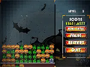 Halloween Crush Adventure free online game screenshot. A grid of matching spooky icons like pumpkins, ghosts, and candies.