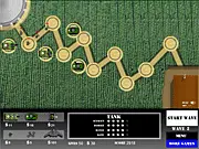 Crop Circles Tower Defense game screenshot showing a farm field being invaded by small alien ships and defensive towers
