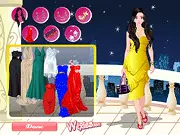 Screenshot of Star Night Fashion online dress up game featuring a character in a stylish evening gown preparing for a party and fireworks.