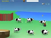 Udder Madness free online game screenshot, frantic cow milking action