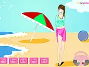 The character Cindy in the Cindy's Beach Dressup online game, standing on the beach and wearing a fashionable outfit for a sunny day.