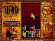 The main game screen for Tetrix 2 Egyptian, showing various colored puzzle blocks falling into a well over a background featuring Egyptian pyramids and hieroglyphics.