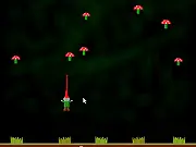 Screenshot of Mushroom Garden Flash showing Ned the Gnome fighting an enemy in a garden level with mushrooms, a free online action adventure game