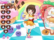 Screenshot of the Fancy Valentine dress-up game showing a model wearing a whimsical, colorful gown inspired by candy, cakes, and other desserts.