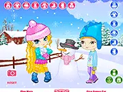 Snowman Adventure free online dress up game featuring two friends, Amy and Paul, wearing colorful winter outfits next to a snowman
