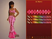 Screenshot from Sari Maker game showing a model wearing a beautifully designed traditional Indian sari or shalwar kameez with rich fabrics, play free online