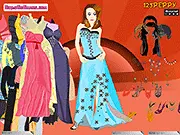 Free online fashion game screenshot of Tunic Dress Up, showing a girl trying on a patterned tunic dress