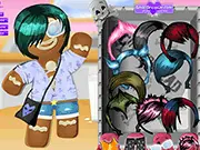 Screenshot of the Emo Gingerbread Man Dressup game showing the cookie character dressed in dark, alternative emo fashion, wearing a striped shirt and dark eyeliner.