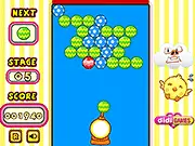 Screenshot of the Save Bird game showing a bubble shooter cannon aiming at a cluster of colorful, patterned balls, with a little bird trapped in the middle.