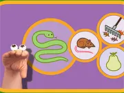 A screenshot of the Oobi: Rhyme Time educational game, showing the puppet character Oobi presenting a central picture, with three choices below it for the player to select the rhyming word using the mouse. Play free on PlayArcadeHub.
