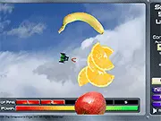 Fruit Muncher free online game screenshot, arcade shooter where the player character collects colorful flying fruit