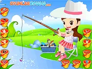 Screenshot of the Summer Fishing Girl dress up game showing a girl in casual summer clothes by a river with a fishing rod.