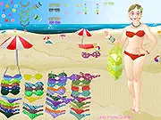 Free online fashion game Day at the Beach Dressup showing a girl in a stylish bikini and accessories at the beach