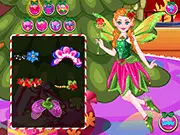 Screenshot of the Flower Fairy Christmas online game showing a beautiful animated fairy ready to be dressed, surrounded by icons of festive Christmas-themed clothing and accessories.