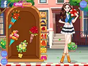 The main screen of the dress-up game Visiting Grandparents, showing Anne the girl with various cute casual clothes and a selection of flowers to choose from