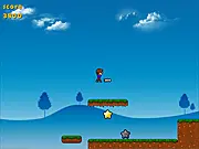 Gameplay screenshot of Patrycjas Wish, showing the character jumping over a spike pit to collect stars in the 2D platformer.