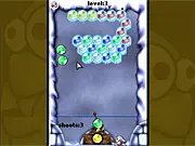 Frozen Bubble free online shooter game screenshot showing colorful bubbles stacked up, with a launcher aiming a new bubble.