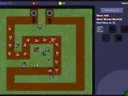 Gameplay screenshot of the tower defense game Terrain Defense, showing multiple defensive towers shooting at a long line of enemy units advancing across a map.