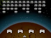 Chrome Invaders game screenshot showing a pixelated cannon at the bottom of the screen firing a laser at rows of blocky alien spaceships descending from the top.