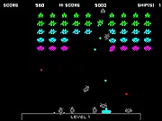 Physics Invader online game screen showing a cannon shooting at alien ships with a large pile of physics-based wreckage debris on the ground