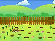 Free online whack-a-mole game Mole Hunter with a mallet poised to hit a mole popping out of the ground
