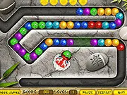 Screenshot of Oriental Marble Blast game showing an ancient dragon shooting colorful gems at a moving chain