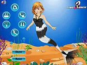 Mermaid Girl Dress Up free online fashion game showing a cute mermaid with a colorful tail and crown surrounded by ocean bubbles