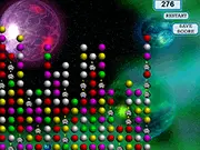 Screenshot of the Spaceballs logic game showing balls or planets arranged in a puzzle configuration