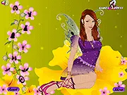 Screenshot of Flower Fairy Dress Up game showing a beautiful fairy adorned with a petal gown, flower crown, and shimmering wings in a garden setting