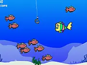 Play Rainbow Fish free online game, survival arcade game, dodge fishing hooks, life of a fish