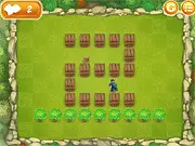 Screenshot from Monkeeper game showing a grid-based puzzle with the Keeper and the Monkey characters on different cells, illustrating their opposite movement challenge.