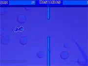 The main character swimming and spinning through an obstacle-filled underwater level in Spin Swim