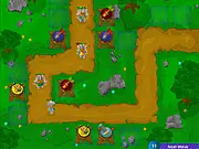 Screenshot of Dwarf TD free online game showing various dwarf defense towers firing at a wave of incoming enemy units