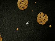Play Commander Cookie free online retro space shooter with stop-motion graphics on PlayArcadeHub.