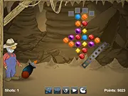 Jewel Mining free puzzle game online screenshot, a claw grabbing diamonds and gems on PlayArcadeHub