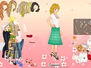 Screenshot of Courteous Dressup game showing a girl trying on a long, elegant dress and matching accessories in the free online fashion game.