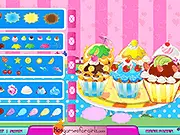 Screenshot of Cup Cake DIY free online game showing a beautifully decorated cupcake with colorful frosting and toppings